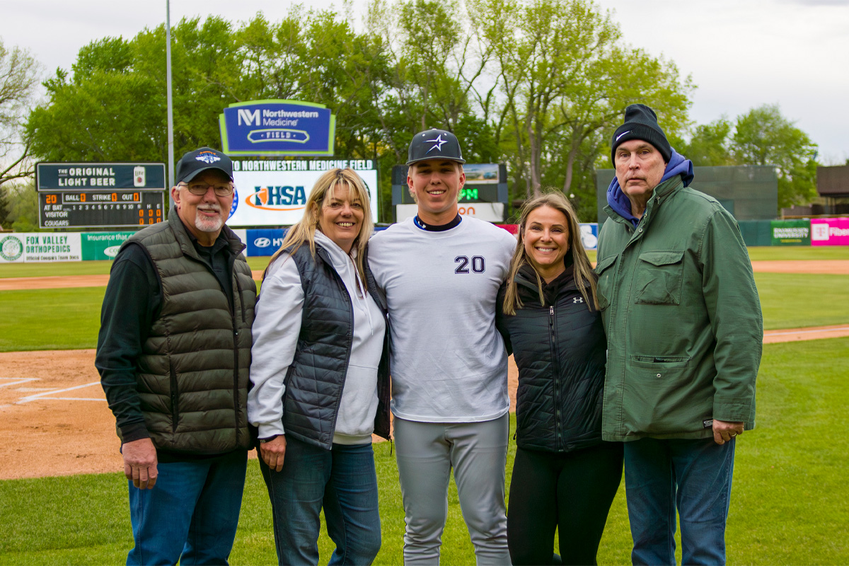 2026 Glue Guy Award Recipient, Jacob Jalove, and Kevin White Foundation Members (Elaina and Bud Meiners, Paul Jones) at Northwestern Medicine Field